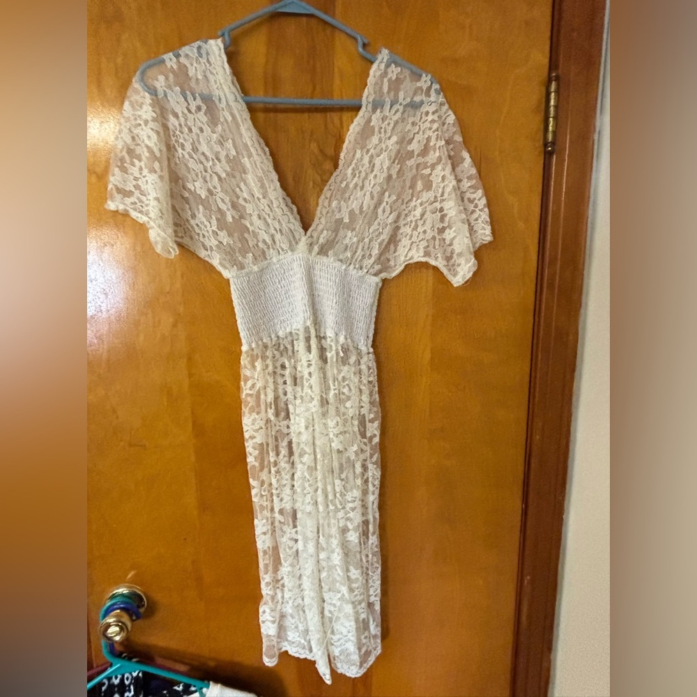 Sheer lace dress.